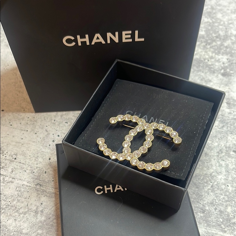 CHANEL Gold Brooch with Iconic Design
